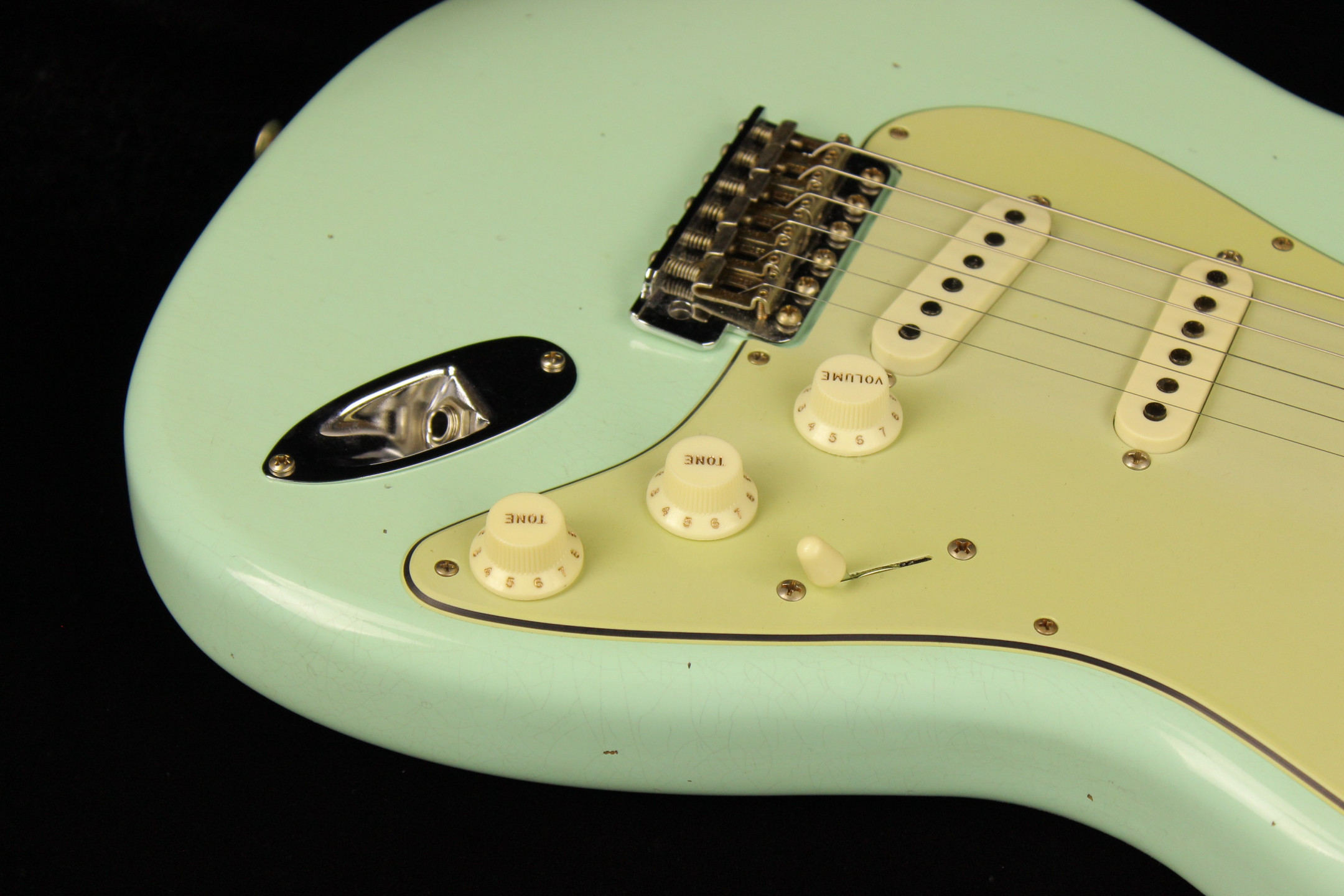 Mint green deals fender guitar